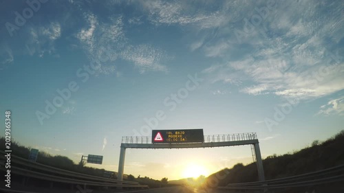 Driving at sunset in highway