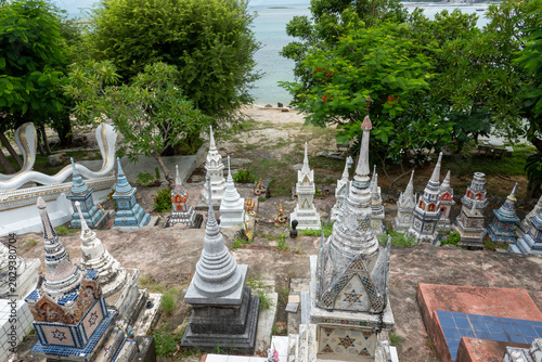 Quadro em tela Traditional colorful Thai Buddhist graves and stupas at a temple