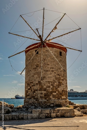 The windmills in Mandraki Harbor in Rhodes Town, built by the Order of Saint John in the 14th and 15th centuries.