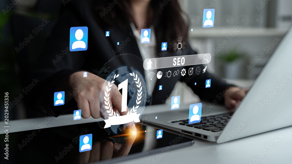 Naklejka premium Business professional analyzing SEO strategy with digital icons representing online presence and user engagement in a modern office setting Quark.