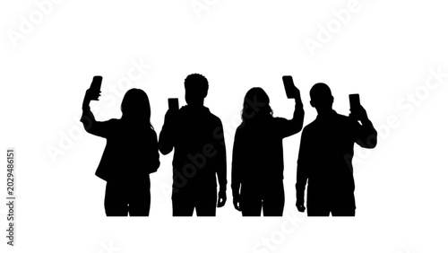 Silhouettes of Four People Taking Photos with Smartphones in a Group