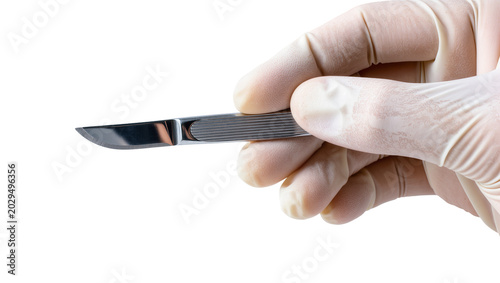 Bild auf Leinwand Hand in glove holding scalpel with sharp blade