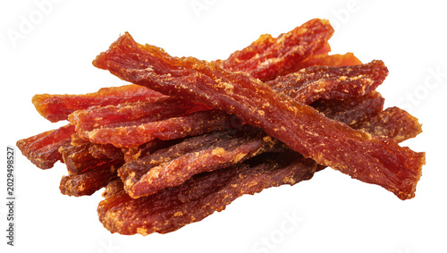 Schilderij op canvas Pile of dried beef jerky strips with rough texture