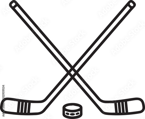 Photography Two crossed hockey sticks and a puck on a white background.
