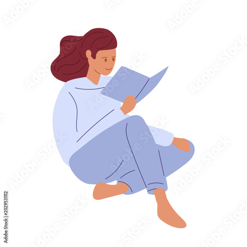 Young girl sits on floor, legs crossed, reading book. Flat illustration for education, learning, student lifestyle, cozy time.