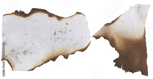 Tableau sur toile Burnt paper edge set: A close-up shot of a burnt paper edge