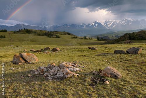 mountain landscape with rainbow