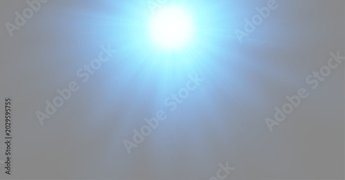 Photos Bright blue sunburst flare from top center with volumetric projector beams, abst