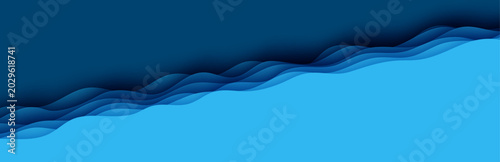 Cut out diagonal deep ocean rift waves floor. Blue layered smooth shadow papercut art. 3d abstract vector origami environment. Wavy top border view paper cut style.