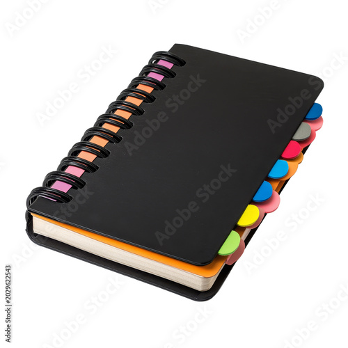 A closed black notebook with colorful tabs rests on a flat surface, showcasing its top view and spiral binding, Closed paper notebook with black coverspiral bindingand colorful tabs