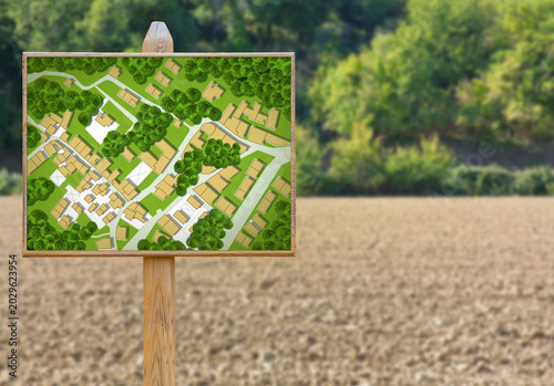 GREEN CITY VILLAGE MAP CONCEPT ON WOODEN SIGN IN RURAL FIELD WITH TREES AND HOUSES - IDEAL FOR URBAN PLANNING, REAL ESTATE, ARCHITECTURE AND RESIDENTIAL DEVELOPMENT CONCEPTS