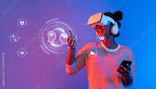 A joyful young woman interacts with virtual reality technology while exploring artificial intelligence concepts, showcasing a vibrant and engaging digital experience at home. XDMCP