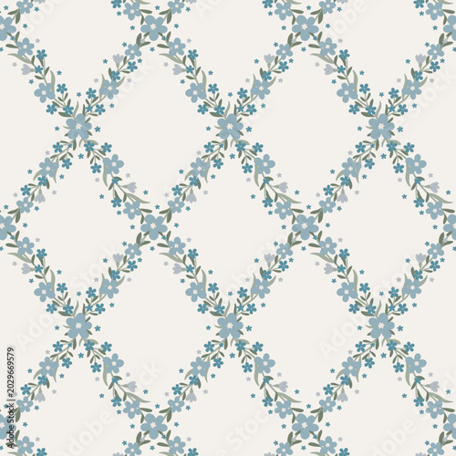Foto Elegant seamless floral trellis pattern with blue forget-me-not flowers and sage green leaves forming ogee diamond lattice on cream background