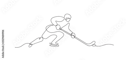 Photography One line drawing of ice hockey player dribbling puck