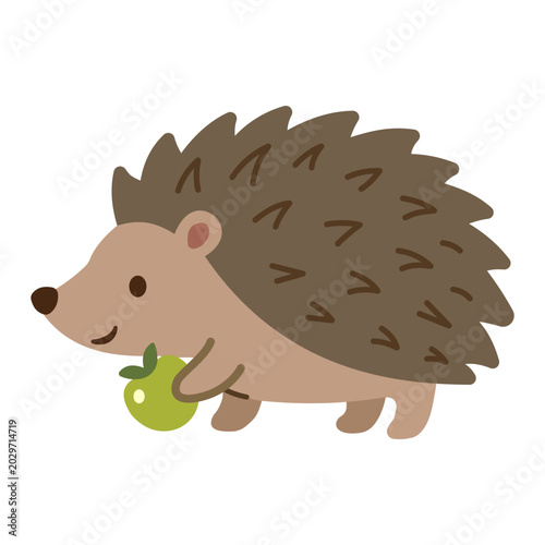 Photos Funny cartoon hedgehog finding and munching on a sour green apple