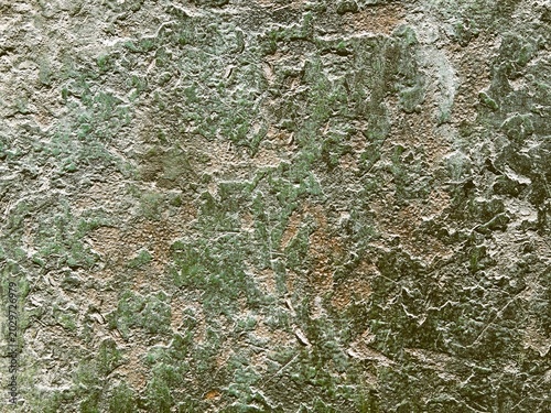 Rough texture of old painted Soviet tank armor, grungy military green weathered metal surface, cast steel background close up.