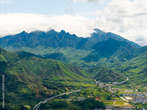 Photography A high angle view of the green mountains and valley landscape in Wuyi Mountain l