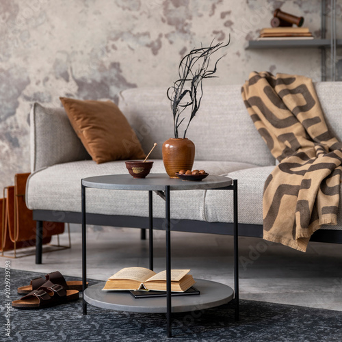 Canvastavla Exquisite and modern composition of living room interior with design grey sofa, rug, round pedant lamp, black coffee table, decoration, pillow and elegant accessories