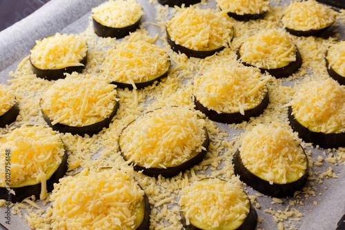 Eggplant with cheese appetizer before oven baking preparation