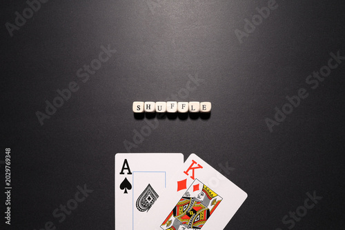 Obraz na płótnie Shuffle concept featuring ace and king playing cards symbolizing randomness, probability reset, and uncertainty in gambling and strategy