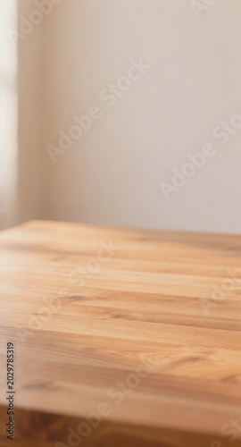 Wooden tabletop with warm blurred home background