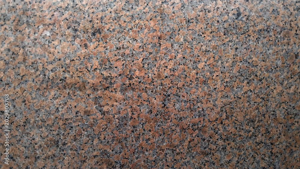 Fototapeta premium Close-up of polished granite texture as a background. Granite motif for background 