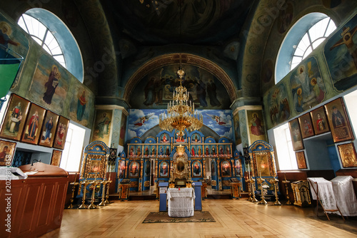 Photos Orthodox church interior with frescoes, iconostasis and vaulted ceiling