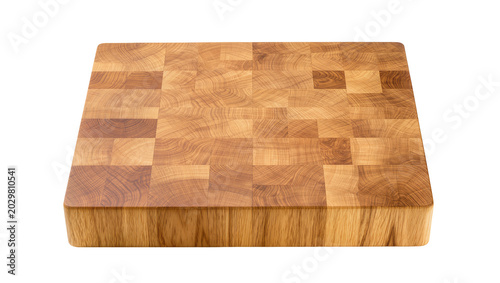 Foto Thick wooden butcher block cutting board with end grain pattern, isolated on tra