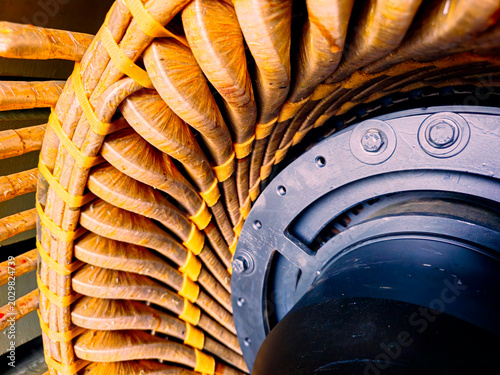 фотографія Close-up detail of copper windings inside a large industrial electric motor or g