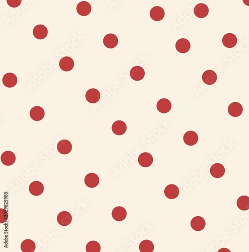Classic red polka dot pattern on cream white background for vintage fashion textile print or cute birthday wrapping paper design