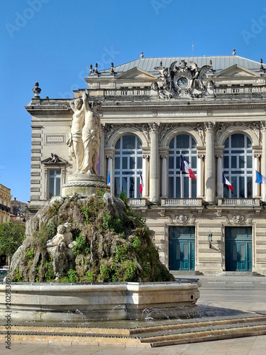 ARLES, FRANCE-APRIL 21, 2026: Comedy square in Montpellier, its opera and the three graces fountain