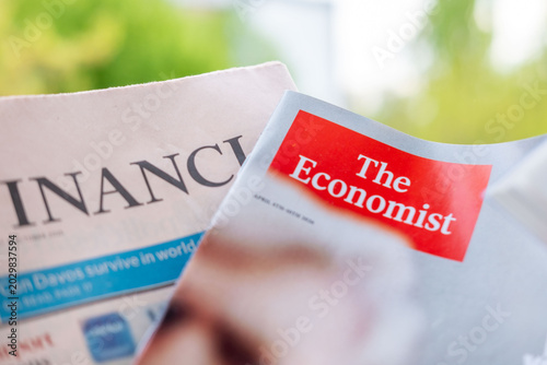 Photos The Economist magazine cover, Financial Times newspaper, Global financial report