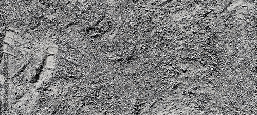 Foto Texture of rough gravel and coarse sand on the ground