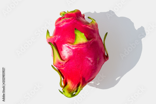 Fresh White Dragon Fruit on White Background in Sunlight
