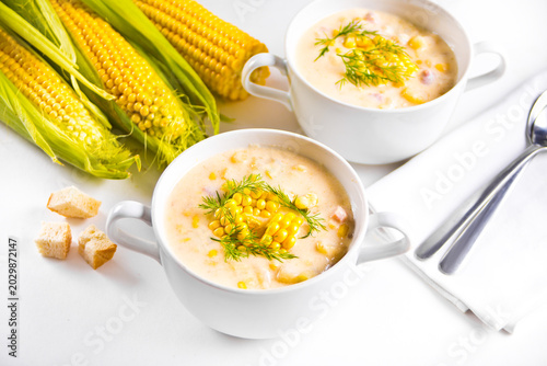 Delicious creamy corn soup in a bowl. Autumn food. Harvest concept