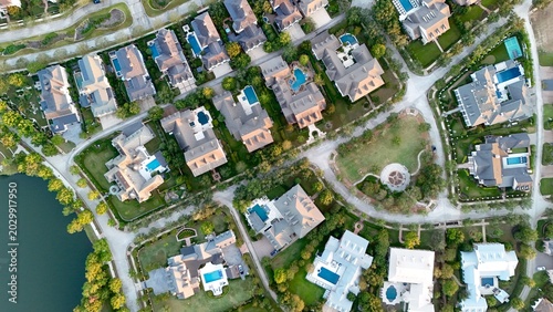 Aerial view of luxury houses with swimming pools by the lake Woodlands in Houston, Texas, United States	
