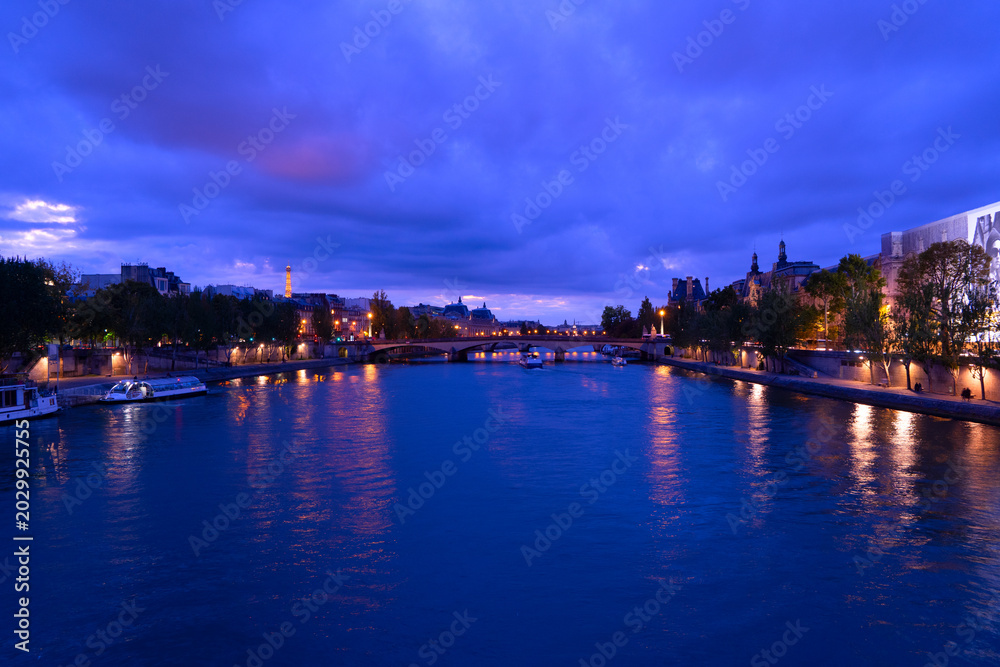 Fototapeta premium river Seine waters at blue night, Paris, France