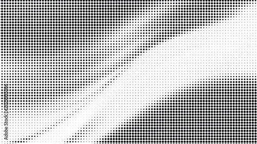 Abstract pattern of black dots with varying sizes and densities on a white background