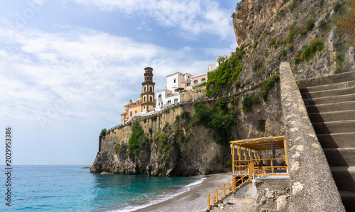 Atrani - Amalfi coast - facade of baroque church Chiesa di Santa Maria Maddalena and Lido di Ravello beach