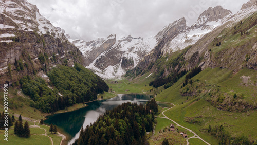 Relaxing Travel Atmosphere at a Picturesque Swiss Mountain Lake captured in Summer.