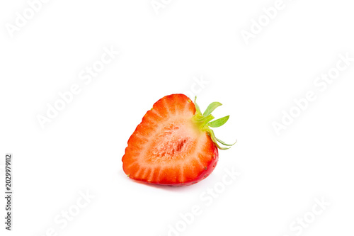 Juicy strawberry isolated on white background. strawberries sliced. Fresh, ripe organic berries. Vegan. Fruits. Vitamins. Strawberry slice.
