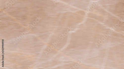 Fotografía A close-up shot of a textured beige marble surface with intricate veining patterns