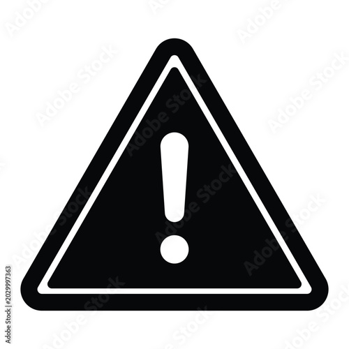 Fotografía A solid black triangular warning sign with a thick white border and a white excl