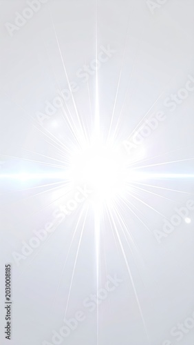Brilliant, starburst light explosion against a soft, white background