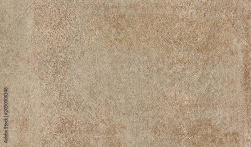 Photos A close-up texture of a rough, natural, beige-brown parchment paper with subtle