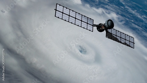 Satellite hovering over the planet Earth to provide weather forecasting about an upcoming hurricane. NASA Public Domain Imagery