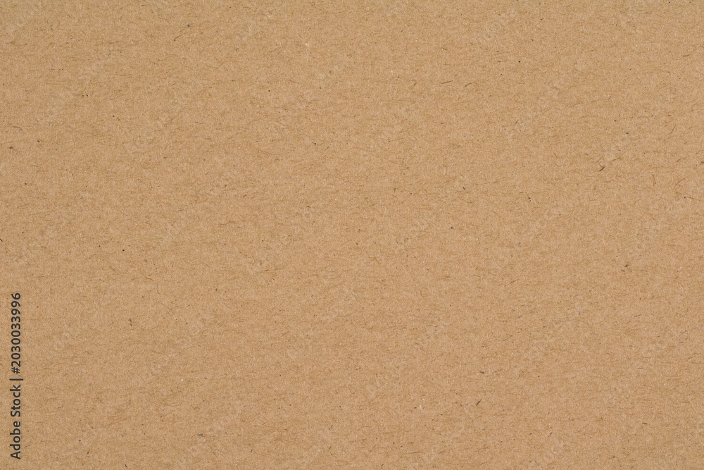 Fototapeta premium Vintage beige paper texture background with subtle grain, speckles, and natural aged surface detail.