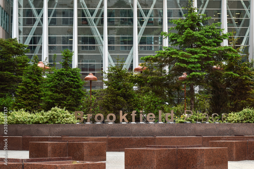 Naklejka premium Brookfield Place signage in front of a modern glass building in downtown Toronto, showing corporate branding and contemporary urban architecture in a financial district setting in May 2026