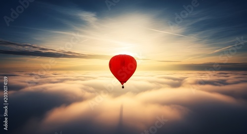 A single red heart shaped balloon floating above a sea of clouds at sunset.