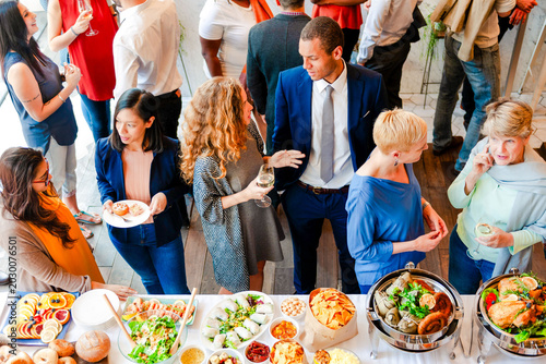 Vibrant social gathering with food